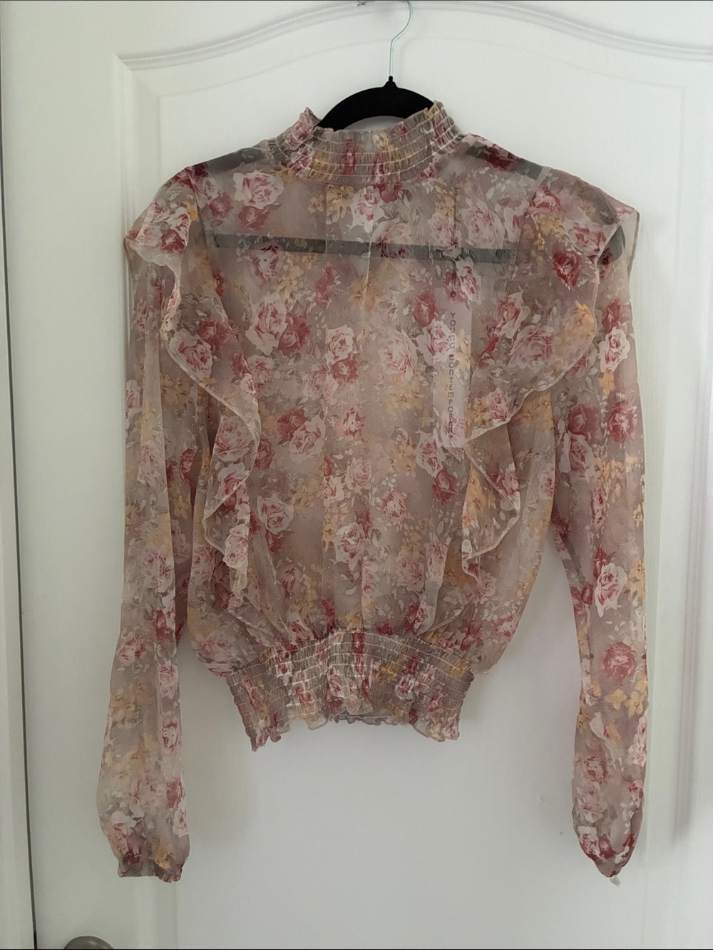 Sheer Pink Floral Ruffle Blouse with Smocked Neck and Hem